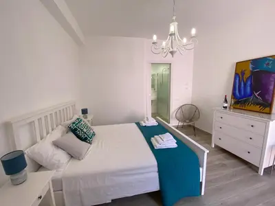 Letto o letti in una camera di Le corti dell'Etna