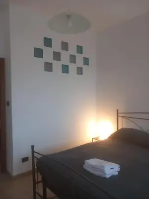 Letto o letti in una camera di Domus Viatoris Catania Centro