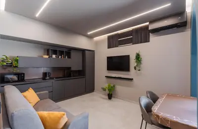 TV o dispositivi per l'intrattenimento presso Tropicalia Suites by Wonderful Italy