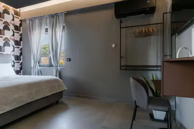 Letto o letti in una camera di Tropicalia Suites by Wonderful Italy