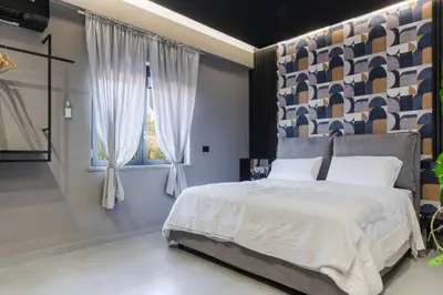 Letto o letti in una camera di Tropicalia Suites by Wonderful Italy