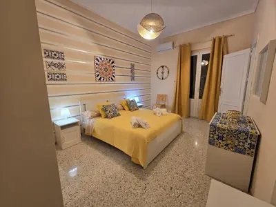 Letto o letti in una camera di Angela's HOME
