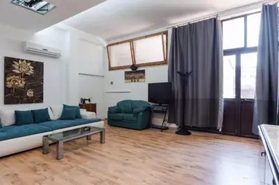 Area soggiorno di Etnea Home with Pool by Wonderful Italy