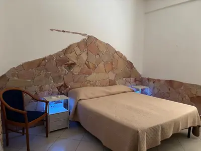 Letto o letti in una camera di Terrace Garden Apartment