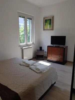 Letto o letti in una camera di Casa Angelina