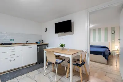Cucina o angolo cottura di GuestHost - Central apartment Caronda Compact