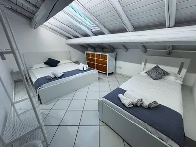 Letto o letti in una camera di Mythos Home