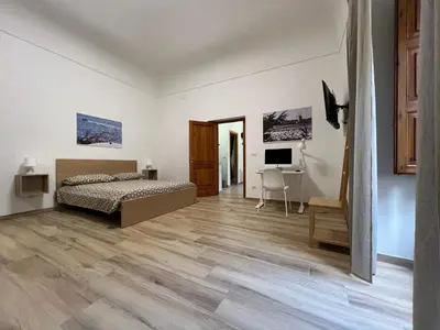 Letto o letti in una camera di Villa Don Minzoni