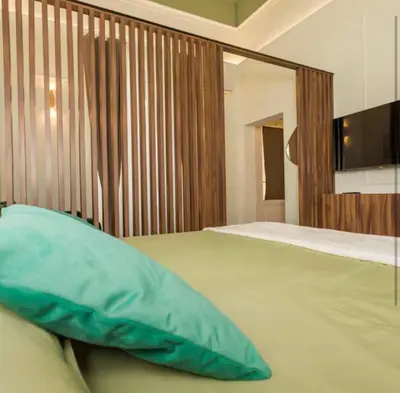 Letto o letti in una camera di La finestra