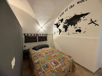Letto o letti in una camera di La Casetta Indipendente