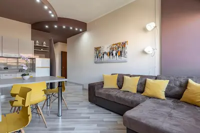 Area soggiorno di GuestHost - Live Catania Vibe by Stesicoro Metro