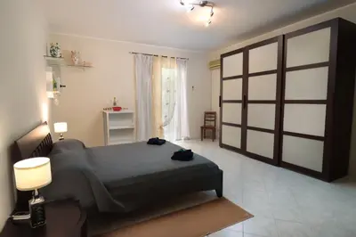 Letto o letti in una camera di Appartamento Le Palme Tra Taormina e Catania