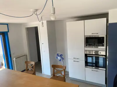 Cucina o angolo cottura di La Luna e la Rana Vacation Home
