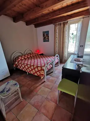 Letto o letti in una camera di Le Case Di Bacco