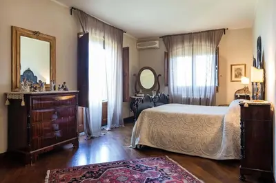 Letto o letti in una camera di Casa Dimora Vittoria