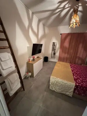 Letto o letti in una camera di Home i Due Obelischi