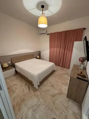 Letto o letti in una camera di Home i Due Obelischi