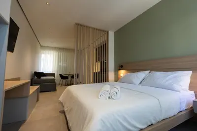 Letto o letti in una camera di Corso Sicilia Apartments