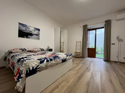 Letto o letti in una camera di Casale Don Minzoni