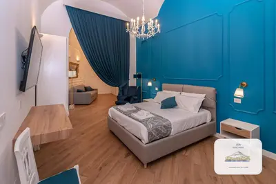 Letto o letti in una camera di Lella Guest House