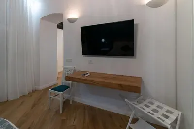 TV o dispositivi per l'intrattenimento presso Lella Guest House