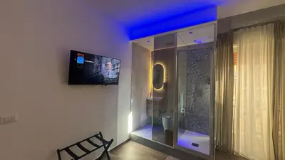 TV o dispositivi per l'intrattenimento presso La Via di Mezzo 2 Apartments