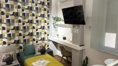 TV o dispositivi per l'intrattenimento presso La Via di Mezzo 2 Apartments