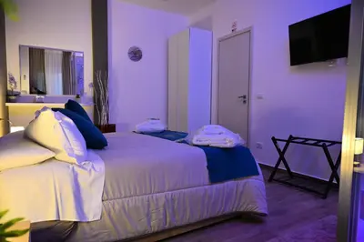 Letto o letti in una camera di La Via di Mezzo 2 Apartments