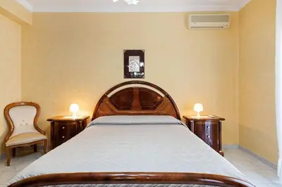 Letto o letti in una camera di Appartamento Sicilia Etna e Mare