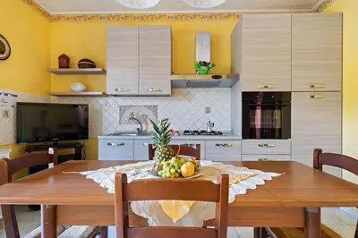 Cucina o angolo cottura di Appartamento Sicilia Etna e Mare