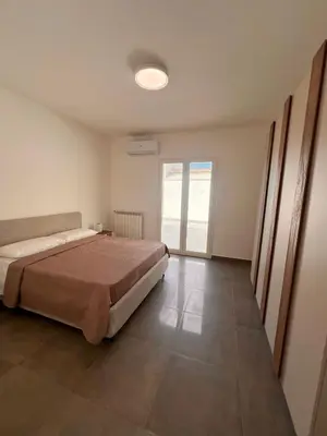 Letto o letti in una camera di Casa Dea