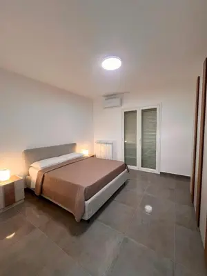 Letto o letti in una camera di Casa Dea