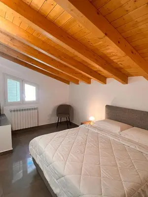 Letto o letti in una camera di Casa Dea Superior