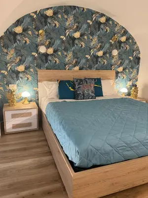 Letto o letti in una camera di Carmela Homes&Residences San Domenico