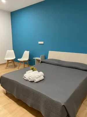 Letto o letti in una camera di Aethna House - Catania Centro Storico
