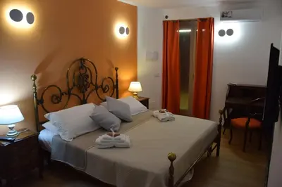 Letto o letti in una camera di Papà Vulcano - Oasi di Pietra