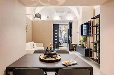 Area soggiorno di Dea Apartment City Living - Catania