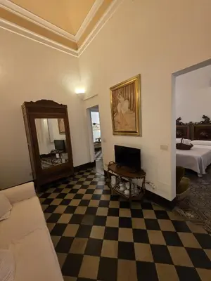 Letto o letti in una camera di Suite Fera 'O Luni