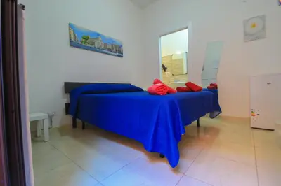 Letto o letti in una camera di bed and fly near 2 fontanarossa 800mt aeroporto catania