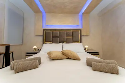 Letto o letti in una camera di Vulcania SuiteA
