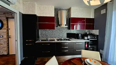 Cucina o angolo cottura di Nizzeti Home Catania Sicily Sea View