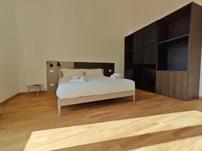 Letto o letti in una camera di Tambasia rooms, Centro storico,Via Etnea
