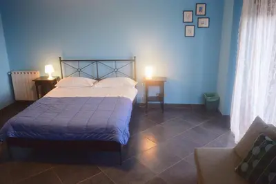 Letto o letti in una camera di B&B Terrazza dell'Etna