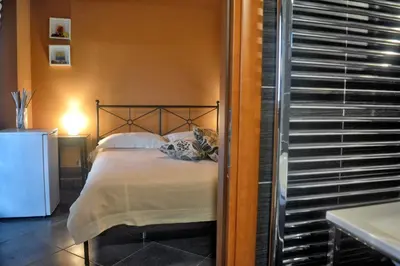 Letto o letti in una camera di B&B Terrazza dell'Etna