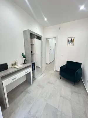 Area soggiorno di Mongibello Apartment