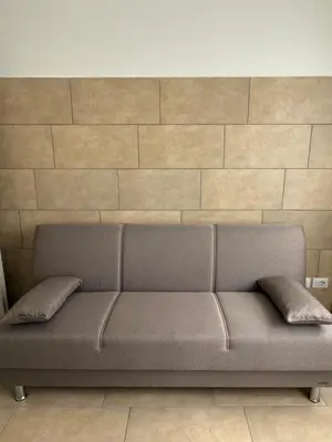 Area soggiorno di De La Salle Apartment