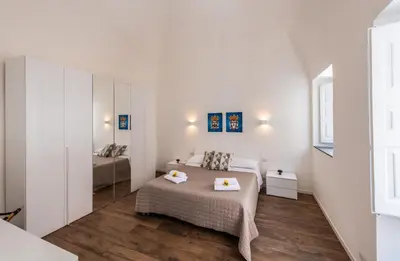 Letto o letti in una camera di Terrazza in Centro - Casa Torres