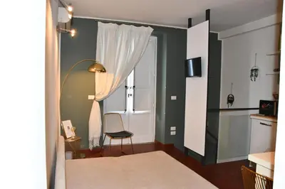 Letto o letti in una camera di Ventimiglia