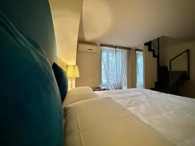 Letto o letti in una camera di Ventimiglia