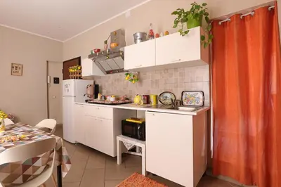 Cucina o angolo cottura di U Casteddu Home Motta Sant'Anastasia 1